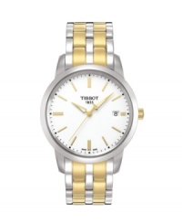 Stunning metal tones and a sleek, minimalist dial set Tissot's Classic Dream watch apart from the rest. Two-tone stainless steel bracelet and round case. White satin dial features goldtone stick indices, date window at three o'clock, luminous hands and logo. Swiss movement. Water resistant to 30 meters. Two-year limited warranty. Stunning metal tones and a sleek, minimalist dial set Tissot's Classic Dream watch apart from the rest. Two-tone stainless steel bracelet and round case. White satin dial features goldtone stick indices, date window at three o'clock, luminous hands and logo. Swiss movement. Water resistant to 30 meters. Two-year limited warranty.