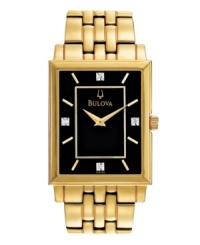 Classic links and polished gold shine on this dress watch by Bulova. Gold tone stainless steel bracelet and rectangular case. Black dial features diamond accent markers at twelve, three, six and nine o'clock, applied gold tone stick indices, two hands and logo. Quartz movement. Water resistant to 30 meters. Three-year limited warranty. Classic links and polished gold shine on this dress watch by Bulova. Gold tone stainless steel bracelet and rectangular case. Black dial features diamond accent markers at twelve, three, six and nine o'clock, applied gold tone stick indices, two hands and logo. Quartz movement. Water resistant to 30 meters. Three-year limited warranty.