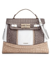 An untamed style with refined appeal. This unique design features an all-over crocodile embossed exterior with polished goldtone hardware and a subtle signature detail at front. An untamed style with refined appeal. This unique design features an all-over crocodile embossed exterior with polished goldtone hardware and a subtle signature detail at front.