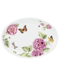 Grow your garden. The Butterfly Meadow Bloom serving platter from Lenox features the sturdy, scalloped porcelain of original Butterfly Meadow dinnerware but with fresh pink and violet blossoms. Grow your garden. The Butterfly Meadow Bloom serving platter from Lenox features the sturdy, scalloped porcelain of original Butterfly Meadow dinnerware but with fresh pink and violet blossoms.