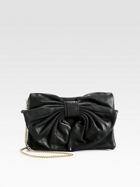 A feminine design in soft and supple leather accented with a large bow.Concealable chain shoulder strap, 22½ dropMagnetic snap flap closureOne inside zip pocketCotton lining11W X 7½H X 1DMade in Italy A feminine design in soft and supple leather accented with a large bow.Concealable chain shoulder strap, 22½ dropMagnetic snap flap closureOne inside zip pocketCotton lining11W X 7½H X 1DMade in Italy