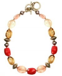 Natural beauty. Jones New York blends pink, amber, coral, and cream-colored plastic beads for an organically-chic necklace. Beaded accents and toggle clasp set in mixed metal. Approximate length: 17 inches + 2-inch extender. Natural beauty. Jones New York blends pink, amber, coral, and cream-colored plastic beads for an organically-chic necklace. Beaded accents and toggle clasp set in mixed metal. Approximate length: 17 inches + 2-inch extender.