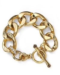Charmed we're sure. Juicy Couture hits the links with this bold bracelet, crafted of plated metal and accented by a classic ring and toggle closure. Charmed we're sure. Juicy Couture hits the links with this bold bracelet, crafted of plated metal and accented by a classic ring and toggle closure.
