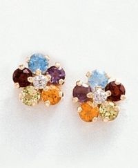With a rainbow of color, these flower-shaped earrings feature glittering diamond centers (.85 ct. t.w.) surrounded by an assortment of semi-precious stones set in 14k gold. Includes amethysts, garnets, blue topaz, peridot and citrine. With a rainbow of color, these flower-shaped earrings feature glittering diamond centers (.85 ct. t.w.) surrounded by an assortment of semi-precious stones set in 14k gold. Includes amethysts, garnets, blue topaz, peridot and citrine.