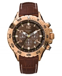 Ruggedly handsome with superior functionality, this Nautica watch features a croc-embossed leather strap and round goldtone stainless steel case. Chronograph brown dial features goldtone stick indices, logo, date window and three subdials. Analog movement. Water resistant to 100 meters. Five-year limited warranty.