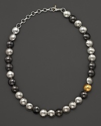 Crafted in hammered dark silver, white silver and 24 Kt. yellow gold, this Lentil necklace from Gurhan brings an earthy elegance to your everyday look. Crafted in hammered dark silver, white silver and 24 Kt. yellow gold, this Lentil necklace from Gurhan brings an earthy elegance to your everyday look.