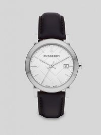 Handsome design of stainless steel with a leather bracelet is crafted with precision quartz movement.Round bezelQuartz movementWater resistant to 5ATMSecond handDate function at 3 o'clockStainless steel case: 38mm(1.49)Leather strapMade in Switzerland Handsome design of stainless steel with a leather bracelet is crafted with precision quartz movement.Round bezelQuartz movementWater resistant to 5ATMSecond handDate function at 3 o'clockStainless steel case: 38mm(1.49)Leather strapMade in Switzerland