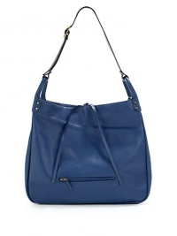 THE LOOKAdjustable flat leather crossbody strapRoomy square silhouetteTie-top closureOne outside zip pocketOne inside zip pocketInside logo detailTHE MEASUREMENTCrossbody chain, 23 drop16½W X 15H X 5DTHE MATERIALLeatherORIGINMade in USA THE LOOKAdjustable flat leather crossbody strapRoomy square silhouetteTie-top closureOne outside zip pocketOne inside zip pocketInside logo detailTHE MEASUREMENTCrossbody chain, 23 drop16½W X 15H X 5DTHE MATERIALLeatherORIGINMade in USA