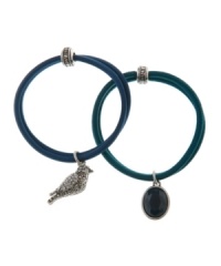 Just wing it. A beautiful bird and glamorous crystal accents adorn this stylish set of elastic hair bands from Lucky Brand. Made in plastic, they're set in silver tone mixed metal. Approximate diameter: 1-3/4 inches. Just wing it. A beautiful bird and glamorous crystal accents adorn this stylish set of elastic hair bands from Lucky Brand. Made in plastic, they're set in silver tone mixed metal. Approximate diameter: 1-3/4 inches.