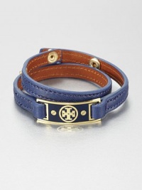 A slim leather piece in a double-wrapped design embellished with an enamel accented logo plaque. Leather16k goldplated brassEnamelLength, about 16.25Snap button closureImported A slim leather piece in a double-wrapped design embellished with an enamel accented logo plaque. Leather16k goldplated brassEnamelLength, about 16.25Snap button closureImported