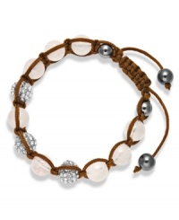 Spiritual-inspired bracelets are all the rage this season! Snap up this hot style from Ali Khan featuring semi-precious rose quartz beads and pave glass fireballs on a trendy brown cord. Bracelet adjusts to fit the wrist. Approximate diameter: 2 inches. Approximate length: 12-1/4 inches. Spiritual-inspired bracelets are all the rage this season! Snap up this hot style from Ali Khan featuring semi-precious rose quartz beads and pave glass fireballs on a trendy brown cord. Bracelet adjusts to fit the wrist. Approximate diameter: 2 inches. Approximate length: 12-1/4 inches.