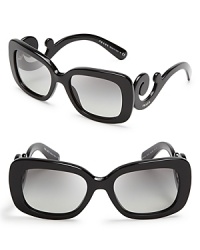 Go for Baroque in Prada's over-the-top sunglasses with statement-making arms. Go for Baroque in Prada's over-the-top sunglasses with statement-making arms.