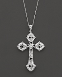 With beautiful filigree detail and diamonds, this cross pendant necklace brings a vintage charm to your look. With beautiful filigree detail and diamonds, this cross pendant necklace brings a vintage charm to your look.