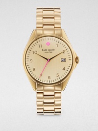 A classic timepiece with a hint of color and a convenient date-function. Quartz movementWater resistant to 5 ATMRound goldtone case, 38mm (1.5)Smooth bezelBrushed goldtone dialNumeric hour markersDate display at 3 o'clockSecond hand Goldtone link braceletImported A classic timepiece with a hint of color and a convenient date-function. Quartz movementWater resistant to 5 ATMRound goldtone case, 38mm (1.5)Smooth bezelBrushed goldtone dialNumeric hour markersDate display at 3 o'clockSecond hand Goldtone link braceletImported