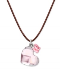 Follow your heart! Add an enchanting accent to your everyday look with Swarovski's mini crystal heart pendant. Includes a delicate butterfly charm detail on a brown cord. Crafted in silver tone mixed metal. Approximate length: 15 inches. Approximate drop: 1 inch. Follow your heart! Add an enchanting accent to your everyday look with Swarovski's mini crystal heart pendant. Includes a delicate butterfly charm detail on a brown cord. Crafted in silver tone mixed metal. Approximate length: 15 inches. Approximate drop: 1 inch.