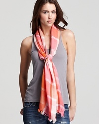 A classic plaid scarf in this season's favorite hues.