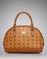 Tap into heritage chic with this logo-splashed canvas satchel from MCM. A modern shape from a favorite brand, this bag feels cooly classic with a duffel coat and checked scarf. Tap into heritage chic with this logo-splashed canvas satchel from MCM. A modern shape from a favorite brand, this bag feels cooly classic with a duffel coat and checked scarf.