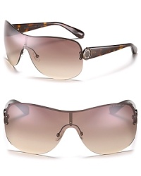 Chic shield sunglasses with a large Marc by Marc Jacob signature logo plate at temples. Chic shield sunglasses with a large Marc by Marc Jacob signature logo plate at temples.