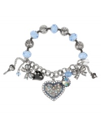 Winning charm. Betsey Johnson's pretty stretch bracelet combines bow and heart charms with blue faceted beads, clear and blue crystal accents, hematite-plating and key embellishments. Set in rhodium-plated mixed metal. Approximate length: 7-1/2 inches. Winning charm. Betsey Johnson's pretty stretch bracelet combines bow and heart charms with blue faceted beads, clear and blue crystal accents, hematite-plating and key embellishments. Set in rhodium-plated mixed metal. Approximate length: 7-1/2 inches.