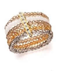 Bring warmth and energy to your ensemble with gold tones and a hint of sparkle. Ali Khan bracelet features five scintillating rows of champagne and neutral-colored glass beads with a row of rhinestone accents. Crafted in gold tone mixed metal. Bracelet stretches to fit wrist. Approximate diameter: 2 inches. Bring warmth and energy to your ensemble with gold tones and a hint of sparkle. Ali Khan bracelet features five scintillating rows of champagne and neutral-colored glass beads with a row of rhinestone accents. Crafted in gold tone mixed metal. Bracelet stretches to fit wrist. Approximate diameter: 2 inches.