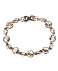 Smokey quartz-colored crystals convey a rich golden brown hue on Givenchy's stretch bracelet, making it a chic complement to your fall wardrobe. Crafted in gold tone mixed metal. Bracelet stretches to fit wrist. Approximate length: 7-1/2 inches. Smokey quartz-colored crystals convey a rich golden brown hue on Givenchy's stretch bracelet, making it a chic complement to your fall wardrobe. Crafted in gold tone mixed metal. Bracelet stretches to fit wrist. Approximate length: 7-1/2 inches.