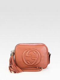 Its name may inspire nights out, but its compact size and go-to ease make this bag a spring essential. Leather adds a hint of refinement to this charming bag.LeatherLight gold hardwareAdjustable leather strap to be worn across the body, 21.6 dropEmbossed interlocking GZip closureInterior phone and open pocketsDetachable leather tasselNatural cotton linen liningSmall size: 8W x 6H x 2.7DMade in Italy Its name may inspire nights out, but its compact size and go-to ease make this bag a spring essential. Leather adds a hint of refinement to this charming bag.LeatherLight gold hardwareAdjustable leather strap to be worn across the body, 21.6 dropEmbossed interlocking GZip closureInterior phone and open pocketsDetachable leather tasselNatural cotton linen liningSmall size: 8W x 6H x 2.7DMade in Italy