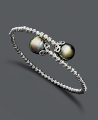 Wrap your wrists with the perfect finishing touch. Elegant bracelet features a unique, wrapped cuff design with cultured Tahitian pearl (9-10 mm) ends and sparkle bead accents. Crafted in sterling silver. Approximate length: 7-1/2 inches. Wrap your wrists with the perfect finishing touch. Elegant bracelet features a unique, wrapped cuff design with cultured Tahitian pearl (9-10 mm) ends and sparkle bead accents. Crafted in sterling silver. Approximate length: 7-1/2 inches.
