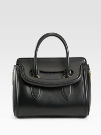 An elegant style in smooth calf leather with expandable side zippers.Double top handles, 4¼ dropFlap closureProtective metal feetOne inside zip pocketTwo inside open pocketsSuede lining12W X 11½H X 3½DMade in Italy An elegant style in smooth calf leather with expandable side zippers.Double top handles, 4¼ dropFlap closureProtective metal feetOne inside zip pocketTwo inside open pocketsSuede lining12W X 11½H X 3½DMade in Italy