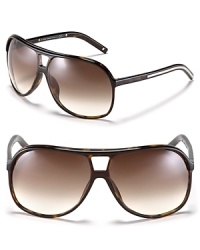 Go for classically cool in retro-inspired aviator sunglasses from Dior. Go for classically cool in retro-inspired aviator sunglasses from Dior.