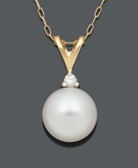 Perfection in the form of a timeless classic. A single cultured freshwater pearl (8-9 mm) with a sparkling diamond accent at the bail looks pristine suspended from a delicate 14k gold setting. Approximate length: 18 inches. Approximate drop: 1/2 inch. Perfection in the form of a timeless classic. A single cultured freshwater pearl (8-9 mm) with a sparkling diamond accent at the bail looks pristine suspended from a delicate 14k gold setting. Approximate length: 18 inches. Approximate drop: 1/2 inch.