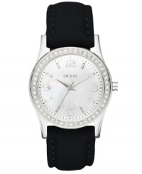 Featuring a serene dial, this DKNY timepiece eases the passage of time. Featuring a serene dial, this DKNY timepiece eases the passage of time.