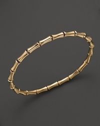 From the Bamboo Collection, a sleek bangle in 18k yellow gold. By Gucci. From the Bamboo Collection, a sleek bangle in 18k yellow gold. By Gucci.