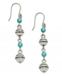 Walk the line this season. Varied sizes of silver tone and reconstituted turquoise beads combine on Lauren by Ralph Lauren's linear drop earrings. Crafted in antiqued silver tone mixed metal. Hangs on fish wire. Approximate drop: 1-1/2 inches. Walk the line this season. Varied sizes of silver tone and reconstituted turquoise beads combine on Lauren by Ralph Lauren's linear drop earrings. Crafted in antiqued silver tone mixed metal. Hangs on fish wire. Approximate drop: 1-1/2 inches.