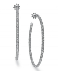 Hoop dreams. Juicy Couture offers these silver tone earrings, crafted from brass, and adorned with glass accents for a touch of glamour. Approximate diameter: 2-1/2 inches. Hoop dreams. Juicy Couture offers these silver tone earrings, crafted from brass, and adorned with glass accents for a touch of glamour. Approximate diameter: 2-1/2 inches.