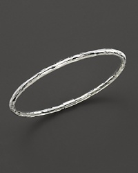From the Silver collection, a skinny hammered bangle in sterling silver. Designed by Ippolita. From the Silver collection, a skinny hammered bangle in sterling silver. Designed by Ippolita.