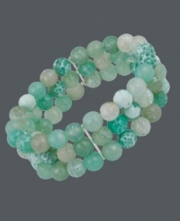 A taste of the tropics. Avalonia Road's destination-themed 3-row bracelet features pretty beads of green fire agate (55 ct. t.w.) with sterling silver accents. Bracelet stretches to fit wrist. Approximate length: 6-1/2 inches. Approximate width: 3/4 inch. A taste of the tropics. Avalonia Road's destination-themed 3-row bracelet features pretty beads of green fire agate (55 ct. t.w.) with sterling silver accents. Bracelet stretches to fit wrist. Approximate length: 6-1/2 inches. Approximate width: 3/4 inch.