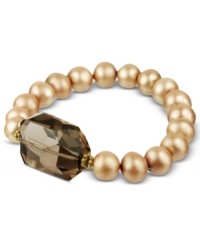 Turn up your elegance factor. This gorgeous stretch bracelet combines light champagne-colored cultured freshwater pearls (8-9 mm) with a chunky faceted smokey quartz (23-3/4 ct. t.w.). Set in 18k gold over sterling silver. Approximate length: 7-1/2 inches. Turn up your elegance factor. This gorgeous stretch bracelet combines light champagne-colored cultured freshwater pearls (8-9 mm) with a chunky faceted smokey quartz (23-3/4 ct. t.w.). Set in 18k gold over sterling silver. Approximate length: 7-1/2 inches.