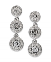 Terrific in triplicate. This pair of three-circle drop earrings from Eliot Danori is crafted from rhodium-plated brass. Crystal and cubic zirconia accents add a lustrous touch. Approximate drop: 1 inch. Terrific in triplicate. This pair of three-circle drop earrings from Eliot Danori is crafted from rhodium-plated brass. Crystal and cubic zirconia accents add a lustrous touch. Approximate drop: 1 inch.