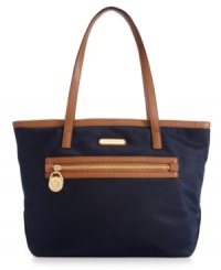 The petite version of it's big sister, this go-anywhere Kempton tote from MICHAEL by Michael Kors is perfect for any outing. Signature 18k gold signature hardware dress up the casual nylon design, while the organized interior features plenty of pockets to safely stow all the essentials. The petite version of it's big sister, this go-anywhere Kempton tote from MICHAEL by Michael Kors is perfect for any outing. Signature 18k gold signature hardware dress up the casual nylon design, while the organized interior features plenty of pockets to safely stow all the essentials.