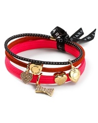 A set of three stylish metallic hair elastics with signature MARC BY MARC JACOBS charms. A set of three stylish metallic hair elastics with signature MARC BY MARC JACOBS charms.