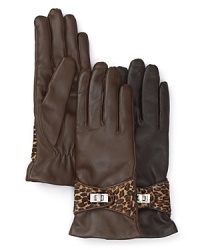 Exotically embellished, Labonia's cashmere-lined leather gloves are buckled with a leopard-print pony hair strap. Exotically embellished, Labonia's cashmere-lined leather gloves are buckled with a leopard-print pony hair strap.