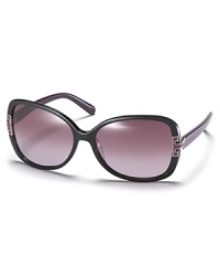 Look elegant in Tory Burch's oversized butterfly frame sunglasses with signature logo detail at temples. Look elegant in Tory Burch's oversized butterfly frame sunglasses with signature logo detail at temples.