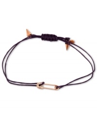 Pin it all together. This RACHEL Rachel Roy bracelet showcases a safety pin charm with glass stone accents. An adjustable purple waxed cotton cord holds it all together. Set in worn gold tone mixed metal. Approximate diameter: 3/4 inch. Adjustable from 1 inch to 7-1/4 inches. Pin it all together. This RACHEL Rachel Roy bracelet showcases a safety pin charm with glass stone accents. An adjustable purple waxed cotton cord holds it all together. Set in worn gold tone mixed metal. Approximate diameter: 3/4 inch. Adjustable from 1 inch to 7-1/4 inches.