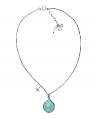 A smooth natural-colored stone with a hint of sparkle. This Fossil necklace features a teardrop-shaped reconstituted turquoise stone with crystal accents, a flower charm, and a bee detail on the back. Crafted in silver tone mixed metal. Approximate length: 18 inches + 2-inch extender. Approximate drop: 1-1/2 inches. A smooth natural-colored stone with a hint of sparkle. This Fossil necklace features a teardrop-shaped reconstituted turquoise stone with crystal accents, a flower charm, and a bee detail on the back. Crafted in silver tone mixed metal. Approximate length: 18 inches + 2-inch extender. Approximate drop: 1-1/2 inches.