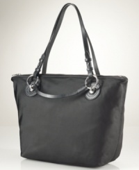 Whether you're perusing a Saturday morning flea market or dining with the ladies who lunch, this gracious tote from Lauren Ralph Lauren is the perfect choice. Sleek nylon with supple leather accents and luxe hardware add a hint of equestrian style, for a look that's altogether exquisite. Whether you're perusing a Saturday morning flea market or dining with the ladies who lunch, this gracious tote from Lauren Ralph Lauren is the perfect choice. Sleek nylon with supple leather accents and luxe hardware add a hint of equestrian style, for a look that's altogether exquisite.