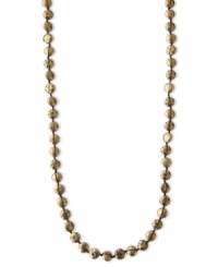 Look money. This golden necklace from Lucky Brand features strands of hammered coin pendants. Crafted in gold tone semi-precious reconstituted calcite and mixed metal. Approximate length: 35 inches. Look money. This golden necklace from Lucky Brand features strands of hammered coin pendants. Crafted in gold tone semi-precious reconstituted calcite and mixed metal. Approximate length: 35 inches.