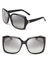 Polarized and oversized, these square sunnies go Gucci with a gold-tone logo at the temples. Polarized and oversized, these square sunnies go Gucci with a gold-tone logo at the temples.