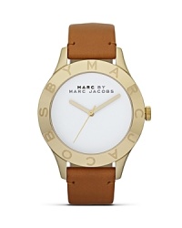 Classically styled with signature detailing. This leather strap watch from MARC BY MARC JACOBS scores major fashion points for it's minimalist design. Classically styled with signature detailing. This leather strap watch from MARC BY MARC JACOBS scores major fashion points for it's minimalist design.