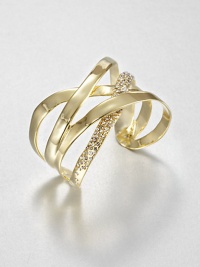 From the Miss Havisham Collection. Undulating ribbons of polished goldtone - one of them set with shimmering Swarovski crystals - form a double X design in this open cuff of simple drama.CrystalGoldtoneDiameter, about 2.25Width, about 1.75Imported From the Miss Havisham Collection. Undulating ribbons of polished goldtone - one of them set with shimmering Swarovski crystals - form a double X design in this open cuff of simple drama.CrystalGoldtoneDiameter, about 2.25Width, about 1.75Imported