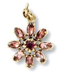 Flower power. A decorative daisy adorns this pretty pendant from Fossil. Featuring a rich purple hue and glass accents with a pronged design, it's crafted in brass tone mixed metal. Approximate drop: 3/4 inch. Flower power. A decorative daisy adorns this pretty pendant from Fossil. Featuring a rich purple hue and glass accents with a pronged design, it's crafted in brass tone mixed metal. Approximate drop: 3/4 inch.